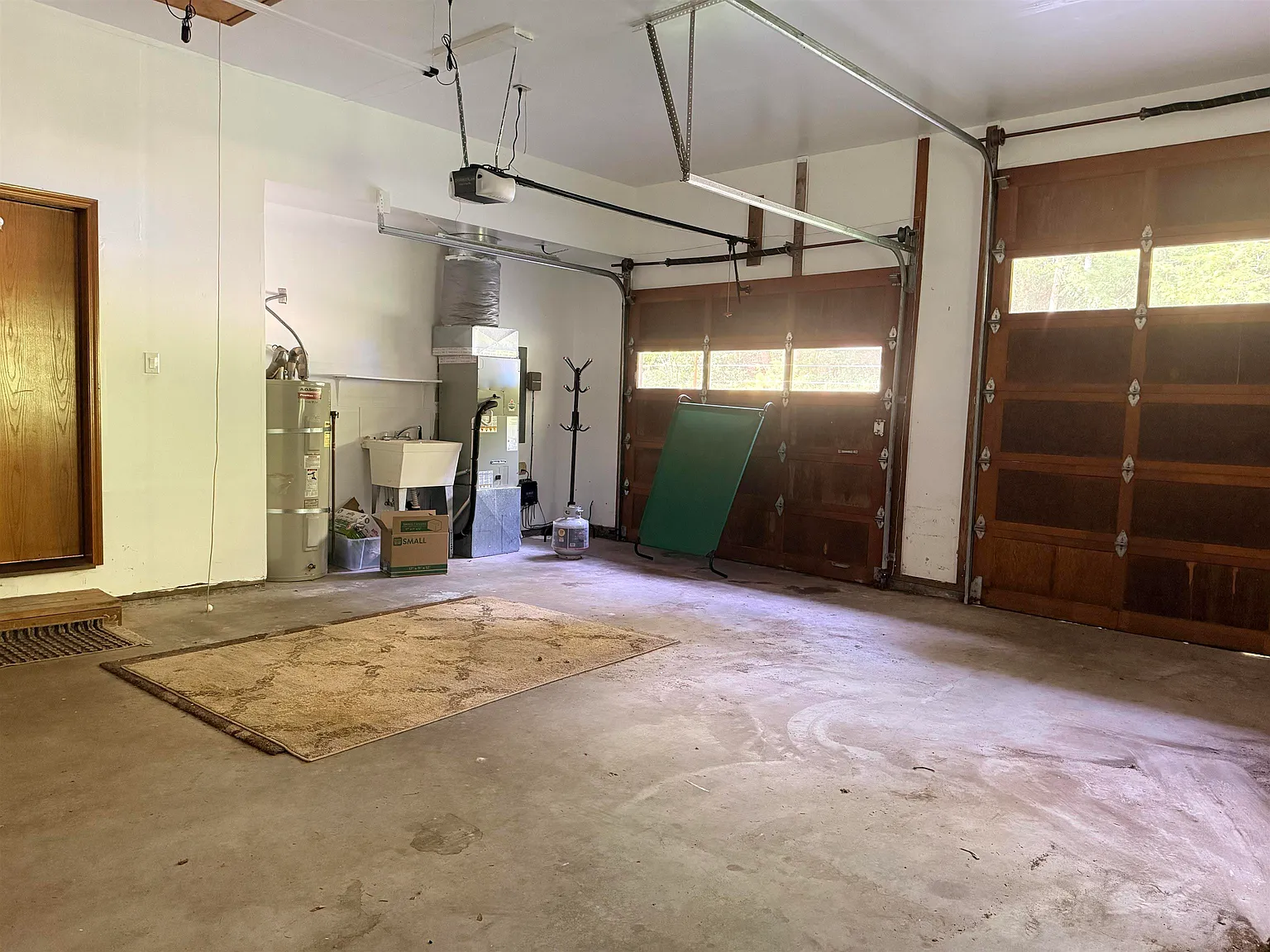 Inside the garage, showing the extra-tall door built to accommodate an RV.